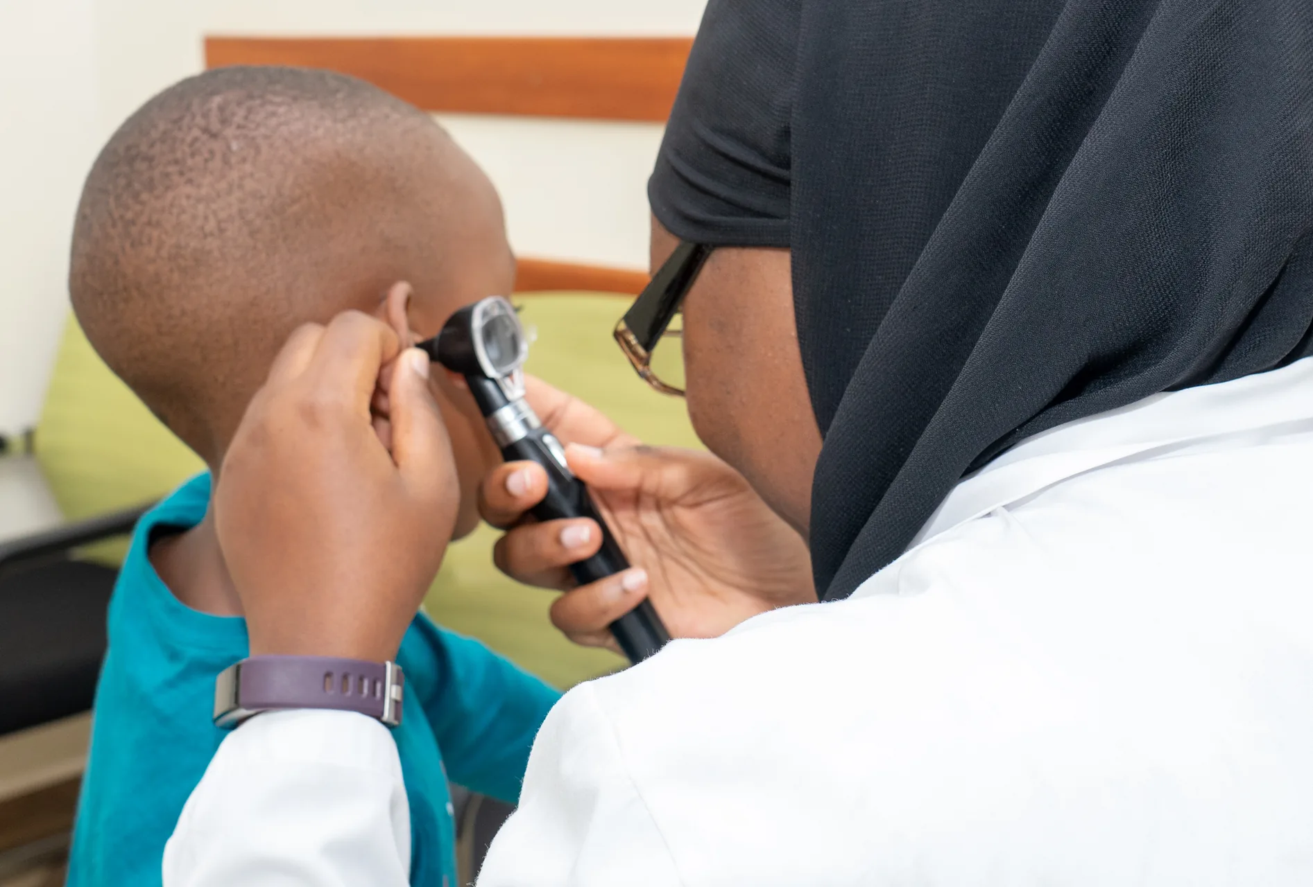 A child attending clinical care