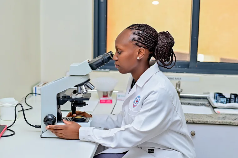 Microscope testing in the laboratory at Doctors’ Hospital Sseguku