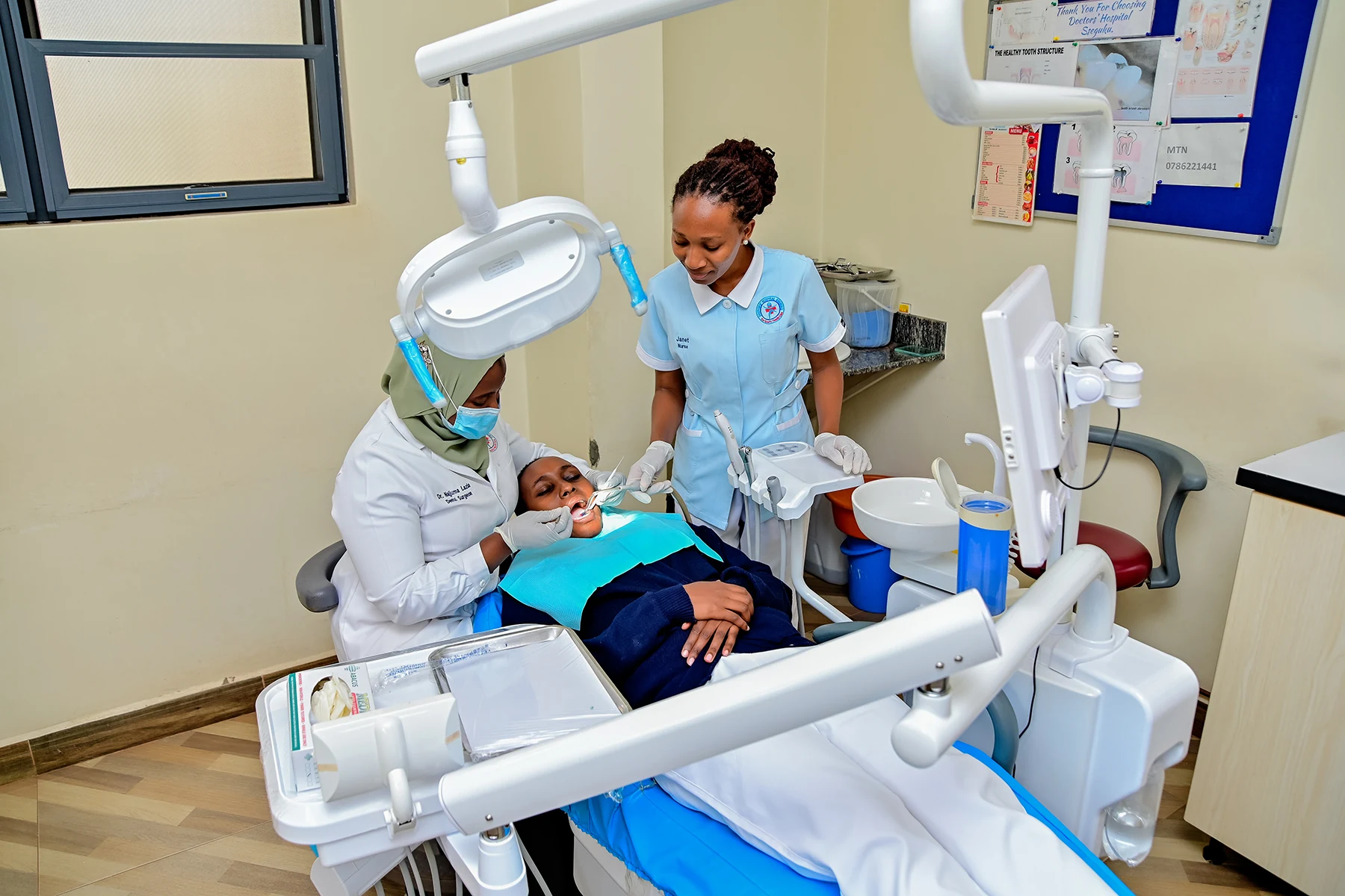 A dental clinician providing treatment